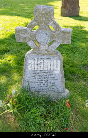 Headstone of comedian Spike Milligan in churchyard of The Parish Church of St Thomas the Martyr, Winchelsea, East Sussex, England, United Kingdom Stock Photo