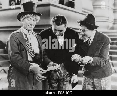 Original Film Title: ANIMAL CRACKERS.  English Title: ANIMAL CRACKERS.  Film Director: VICTOR HEERMAN.  Year: 1930.  Stars: HARPO MARX; THE MARX BROTHERS; CHICO MARX. Credit: PARAMOUNT PICTURES / Album Stock Photo