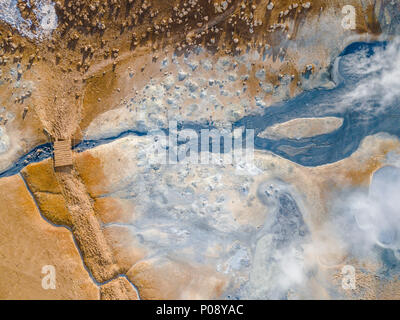 Aerial view, small bridge over steaming river and fumaroles, geothermal area Hverarönd, also Hverir or Namaskard, North Iceland Stock Photo