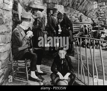 Original Film Title: THE PERSONAL HISTORY, ADVENTURES, EXPERIENCE, & OBSERVATION OF DAVID COPPERFIELD THE YOUNGER.  English Title: DAVID COPPERFIELD.  Film Director: GEORGE CUKOR.  Year: 1935.  Stars: W. C. FIELDS; FREDDIE BARTHOLOMEW. Credit: M.G.M / Album Stock Photo