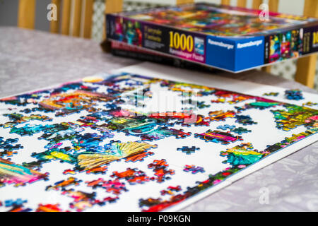 Large 1000 piece jigsaw puzzle pieces, multi colour, colourful educational family fun Stock Photo