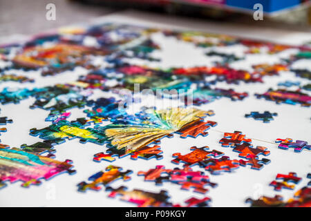 Large 1000 piece jigsaw puzzle pieces, multi colour, colourful educational family fun Stock Photo
