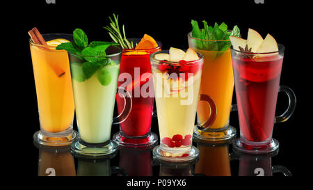 Set of tasty fruit tea in cups Stock Photo