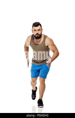 man running forward on white background Stock Photo