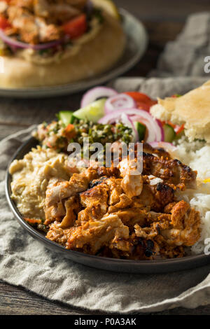 Homemade Doner Kebab Plate with Hummus Rice and Pita Stock Photo