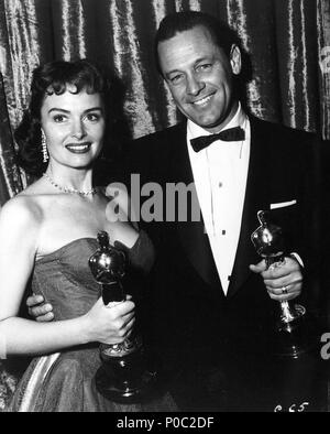 Description: The 26th Academy Awards / 1954.   William Holden, best actor for 'Stalag 17'. Donna Reed, best actress in a supporting role for 'From Here to Eternety'..  Year: 1954.  Stars: DONNA REED; WILLIAM HOLDEN. Stock Photo