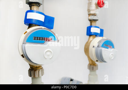 Blue modern radio wireless water counter meter close up Stock Photo