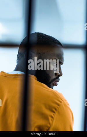 african american prisoner in prison cell Stock Photo