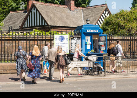 Blue Police box used as a coffee kiosk outside the Botanic Gardens, Great Western Road, Glasgow, Scotland, UK Stock Photo