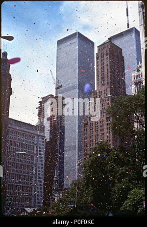 First Iraq war NYC ticker tape parade with the twin towers in the background and confetti flying all over the air Stock Photo