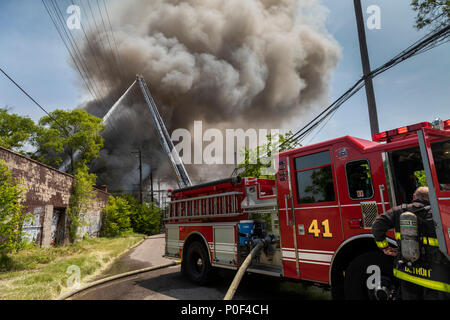 Detroit, Michigan - Firefighters at a building fire on Detroit's east side. Stock Photo