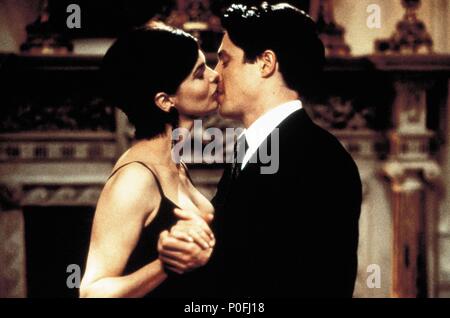 Original Film Title: MICKEY BLUE EYES.  English Title: MICKEY BLUE EYES.  Film Director: KELLY MAKIN.  Year: 1999.  Stars: HUGH GRANT; JEANNE TRIPPLEHORN. Credit: UNIVERSAL PICTURES / Album Stock Photo