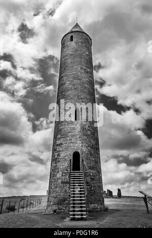 This is a picture of the old monastic round tower on Devenish Island in County Fermanagh, Ireland.  The island has ruins of an old monastery that is o Stock Photo