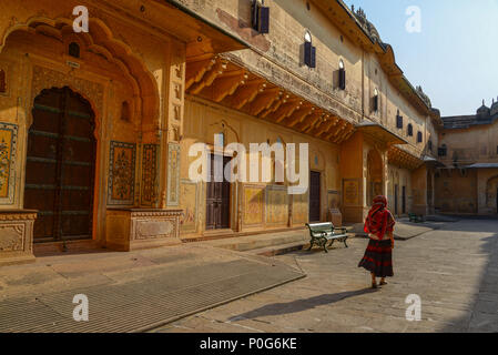 A young woman (travaler) walking at the ancient fort in Jaipur, India. Stock Photo