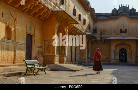 A young woman (travaler) walking at the ancient fort in Jaipur, India. Stock Photo