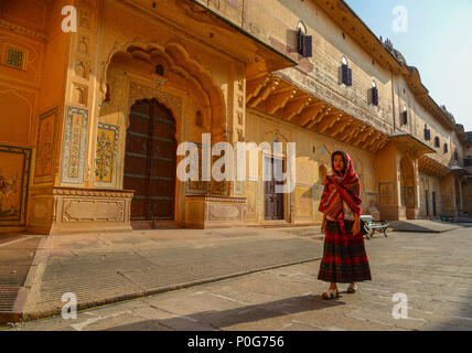 A young woman (travaler) walking at the ancient fort in Jaipur, India. Stock Photo