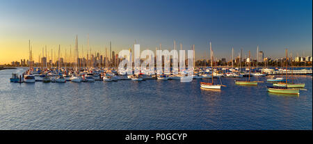 Panoramic view of Melbourne cityscape from St Kilda at sunset time