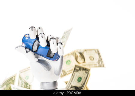 robotic arm holding small blue car model and dollar banknotes isolated on white Stock Photo
