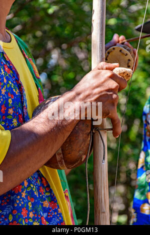 Berimbau player playing his instrument during typical folk festival in the interior of Brazil Stock Photo