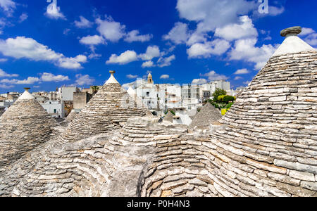 Alberobello, Puglia, Italy: Cityscape over the traditional roofs of the Trulli, original and old houses of this region, Apulia Stock Photo