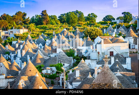 Alberobello, Puglia, Italy: Cityscape over the traditional roofs of the Trulli, original and old houses of this region, Apulia Stock Photo