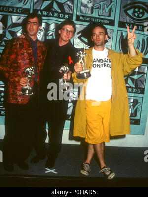 UNIVERSAL CITY, CA - SEPTEMBER 05: (L-R) Musicians/singers Bill Berry, Mike Mills and Michael Stipe of R.E.M. group attend the Eighth Annual MTV Video Music Awards on September 5, 1991 at Universal Amphitheatre in Universal City, California. Photo by Barry King/Alamy Stock Photo Stock Photo