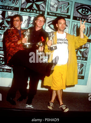 UNIVERSAL CITY, CA - SEPTEMBER 05: (L-R) Musicians/singers Bill Berry, Mike Mills and Michael Stipe of R.E.M. group attend the Eighth Annual MTV Video Music Awards on September 5, 1991 at Universal Amphitheatre in Universal City, California. Photo by Barry King/Alamy Stock Photo Stock Photo