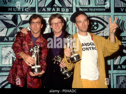 UNIVERSAL CITY, CA - SEPTEMBER 05: (L-R) Musicians/singers Bill Berry, Mike Mills and Michael Stipe of R.E.M. group attend the Eighth Annual MTV Video Music Awards on September 5, 1991 at Universal Amphitheatre in Universal City, California. Photo by Barry King/Alamy Stock Photo Stock Photo