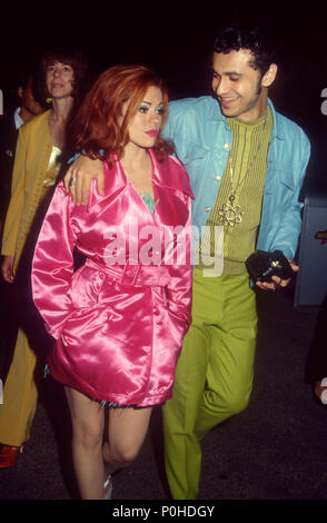 UNIVERSAL CITY, CA - SEPTEMBER 05: (L-R) Singers/musicians Dmitry Brill and Lady Miss Kier of Deee-Lite attend the Eighth Annual MTV Video Music Awards on September 5, 1991 at Universal Amphitheatre in Universal City, California. Photo by Barry King/Alamy Stock Photo Stock Photo