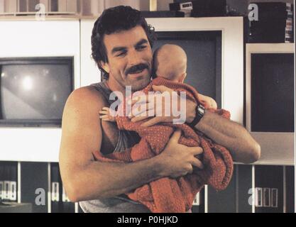 Original Film Title: THREE MEN AND A BABY.  English Title: THREE MEN AND A BABY.  Film Director: LEONARD NIMOY.  Year: 1987.  Stars: TOM SELLECK. Credit: TOUCHSTONE PICTURES / Album Stock Photo