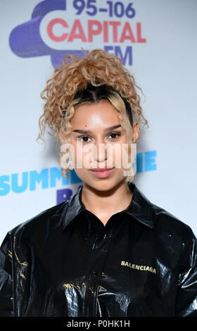 Raye on the red carpet of the media run at Capital's Summertime Ball with Vodafone at Wembley Stadium, London. PRESS ASSOCIATION Photo. This summer's hottest artists performed live for 80,000 Capital listeners at Wembley Stadium at the UK's biggest summer party. Performers included Camila Cabello, Shawn Mendes, Rita Ora, Charlie Puth, Jess Glyne, Craig David, Anne-Marie, Rudimental, Sean Paul, Clean Bandit, James Arthur, Sigala, Years & Years, Jax Jones, Raye, Jonas Blue, Mabel, Stefflon Don, Yungen and G-Eazy. Picture date: Saturday June 9, 2018. Photo credit should read: Ian West/PA Wire Stock Photo