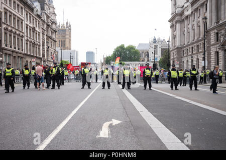London, UK, 9 June 2018. Supporters of Tommy Robinson, a right wing extremist are arriving on mass in London today in protest at his recent imprisonment. Tommy has since pleaded guilty to the charges he is held on. However the protest, attracting members of the public from across the UK and abroad, is still going ahead - bringing the agenda into question. #FreeTommy #FreeTommyRobinson Credit: Joshua Preston/Alamy Live News