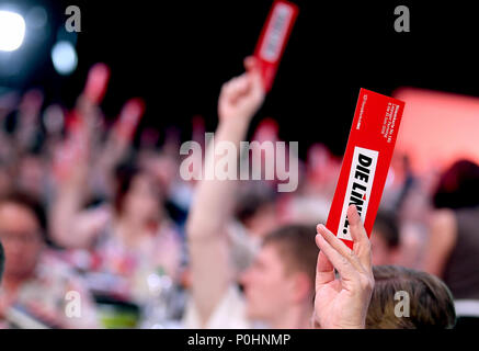 09 June 2018, Germany, Leipzig: Delegates of The Left party hold up their voting ballots at the national party conference of The Left party. Photo: Britta Pedersen/dpa Stock Photo