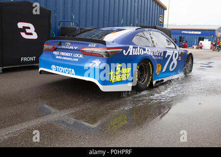 Brooklyn, Michigan, USA. 12th May, 2018. NASCAR driver MARTIN TRUEX JR. (78) drives through the garage area at Michigan International Speedway. Credit: Scott Mapes/ZUMA Wire/Alamy Live News Stock Photo