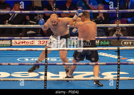 Manchester Arena, Manchester, UK. 9th June, 2018. Frank Warren Boxing Promotions, Tyson Fury versus Sefer Seferi, undercard fight: A left hook from Nathan Gorman in a Heavyweight Contact fight against Sean Turner Credit: Action Plus Sports/Alamy Live News Stock Photo