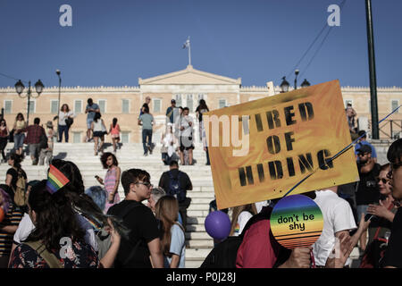 Athens, Greece. 9th June 2018. A placard seen front of the Greek Parliament at the festival. This year's Pride theme was discrimination against women, with transnational women receiving lasting and unstoppable marginalization and violence. Credit: SOPA Images Limited/Alamy Live News Stock Photo