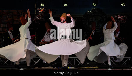 Chiuduno, Italy. 8th June 2018. The Turkish whirling dancers or Sufi whirling dancers performing of the Mevlevi (whirling dervish) sema  at the festival LO SPIRITO DEL PIANETA Credit: Simone Brambilla/Alamy Live News The Turkish whirling dancers or Sufi whirling dancers performing of the Mevlevi (whirling dervish) sema  at the festival LO SPIRITO DEL PIANETA Credit: Simone Brambilla/Alamy Live News Stock Photo