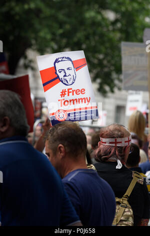London, UK. 9th June 2018. People protesting about the imprisonment of Tommy Robinson gather in Whitehall, outside Downing street, London, England, to express their views on 9th June 2018, the day of the Queen's birthday celebrations. Credit: Michael Foley/Alamy Live News Stock Photo