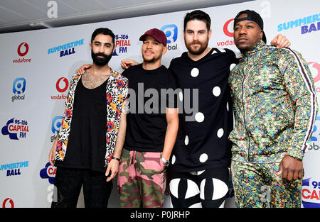 Left to right, Amir Amor, Kesi Dryden, Piers Agget and DJ Locksmith of Rudimental on the red carpet of the media run at Capital's Summertime Ball with Vodafone at Wembley Stadium, London. Stock Photo