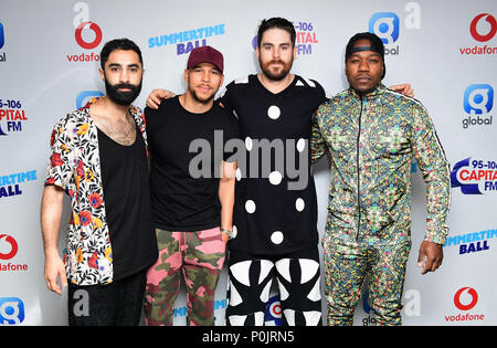 Left to right, Amir Amor, Kesi Dryden, Piers Agget and DJ Locksmith of Rudimental on the red carpet of the media run at Capital's Summertime Ball with Vodafone at Wembley Stadium, London. Stock Photo