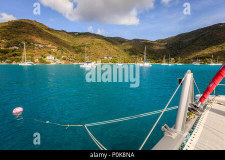 Sailing catamaran on a mooring ball in a harbor in British Virgin Islands Stock Photo