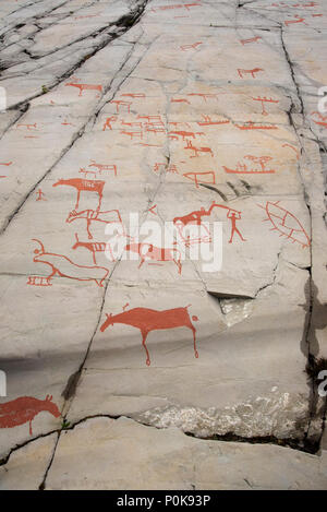 More than 7000 years ago  stoneage fishermen and Reindeer herders made rock carvings around World heritage site Alta in Fimnmark province in Norway-