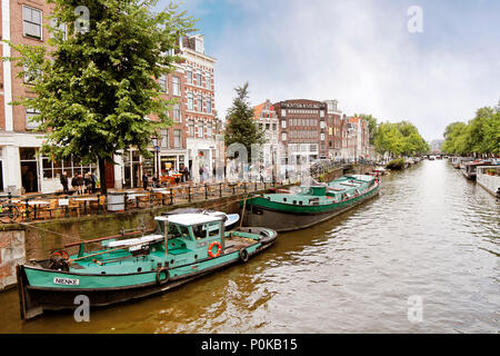Amsterdam, capital of the Netherlands, has more than one hundred kilometres of canals, about 90 islands and 1,500 bridges. Stock Photo