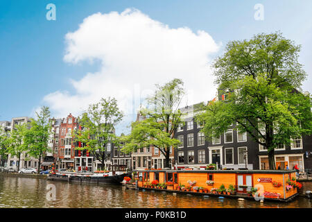 Amsterdam, capital of the Netherlands, has more than one hundred kilometres of canals, about 90 islands and 1,500 bridges. Stock Photo