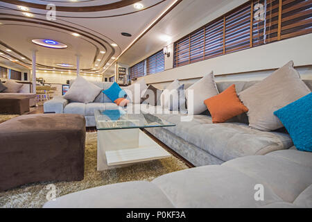 Interior design furnishing decor of the salon area in a large luxury motor yacht Stock Photo