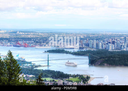 Panorama of downtown Vancouver skyline as seen from Cypress Mountain showing Lions Gate Bridge, Stanley Park, Harbor, and the downtown business and fi Stock Photo