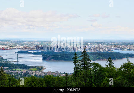 HDR rendering of downtown Vancouver skyline as seen from Cypress Mountain showing Lions Gate Bridge, Stanley Park, Harbor, and the downtown business a Stock Photo
