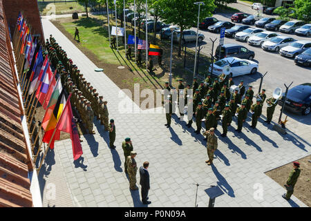 Service members from the United States, Lithuania and several other nations participate in the opening ceremony of Saber Strike 18 in Vilnius, Lithuania, June 3, 2018. The ceremony marks the start of the multinational exercise scheduled to run from June 3-15 that tests 19 participating countries on their ability to work together to deter aggression in the region and improve each unit’s ability to perform their designated missions. (U.S. Army photo by Sgt. Gregory T. Summers / 22nd Mobile Public Affairs Detachment) Stock Photo