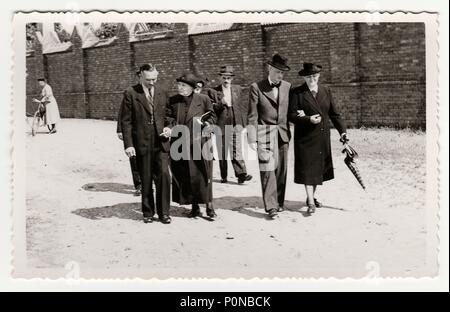HODONIN, THE CZECHOSLOVAK REPUBLIC, CIRCA 1940:  Vintage photo shows a group of people during a walk, circa 1940. Stock Photo