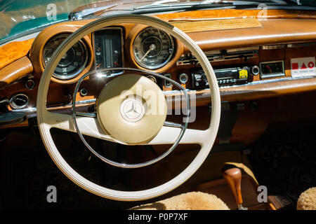 Berlin, Germany - june 09, 2018: Steering wheel, dashboard and interior of beautiful vintage car cockpit at Classic Days, a Oldtimer  event for vintag Stock Photo